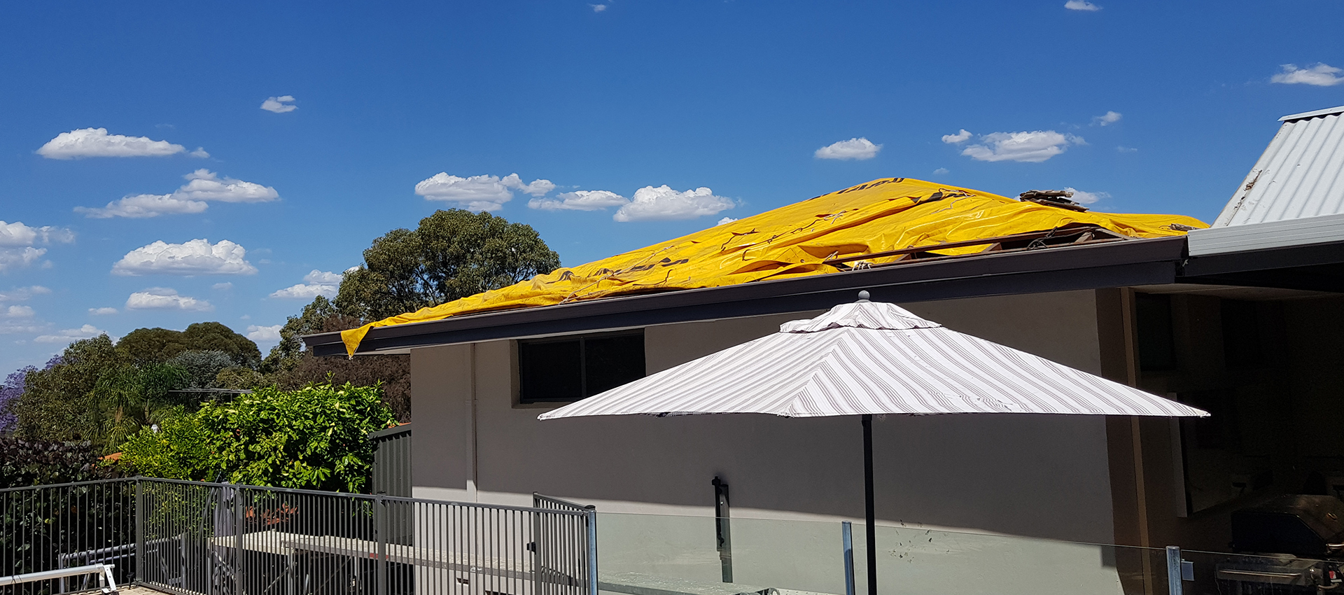 Roof tarping